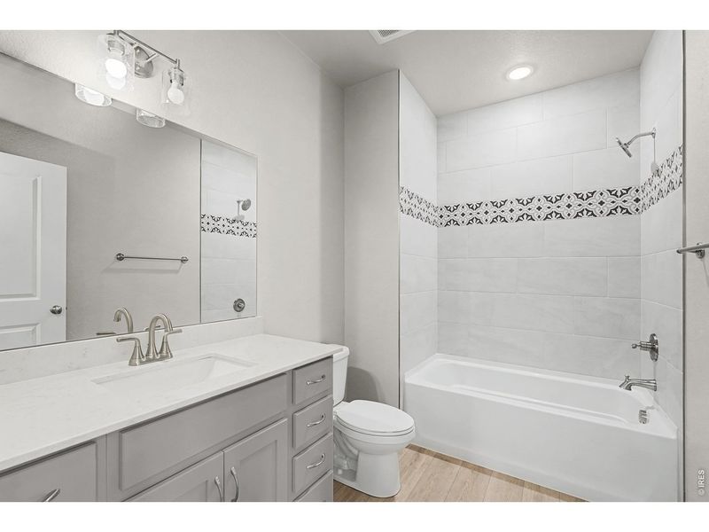 Furnished interior view inside a new home in Highlands at Fox Hill - The Flats, Longmont (Image 7).