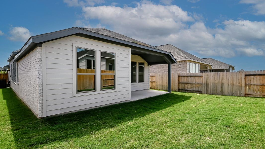 Exterior details and patio area of a home in Crosswinds 40', Kyle (Image 27).