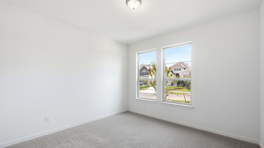 Furnished interior view inside a new home in Oaks at San Gabriel, Georgetown (Image 15).