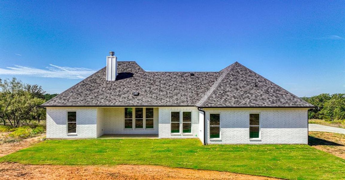 Front exterior of a new home in , Weatherford, TX, highlighting curb appeal (Image 1). Front exterior of a new home in , Weatherford, TX, highlighting curb appeal (Image 1).
