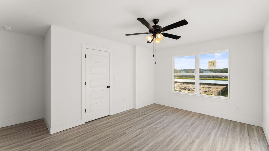 Spacious, unfurnished interior of a new home in Colonial East Townhomes, Panama City Beach (Image 23).