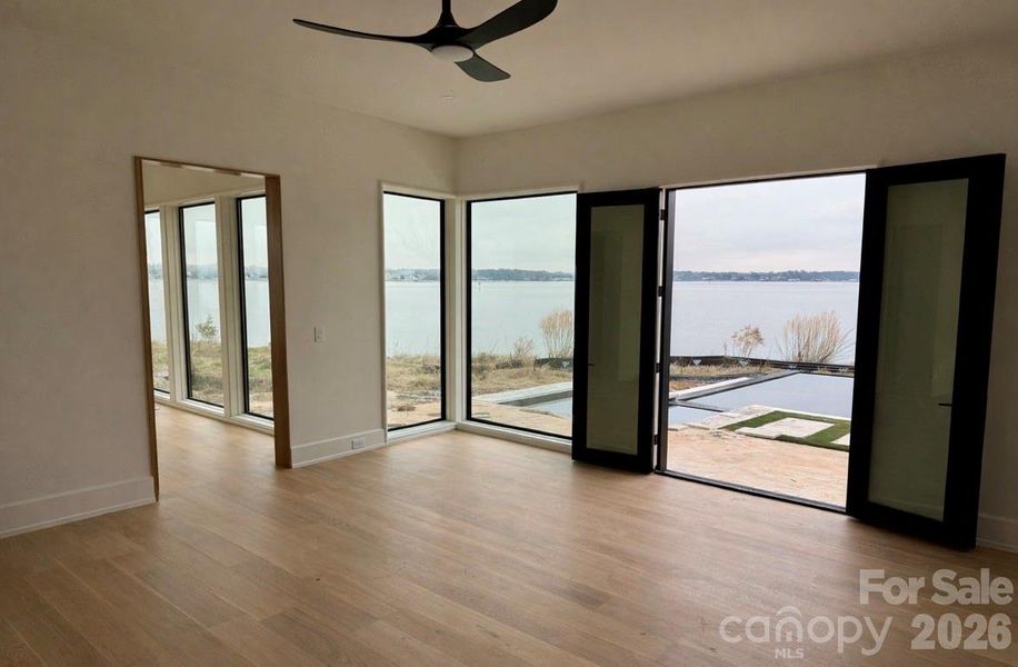 Primary Suite, Main Floor Access to Pool/Hot Tub