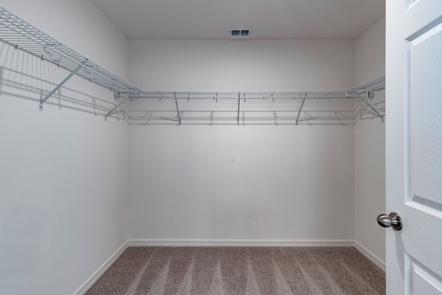 Spacious Primary Closet with Ample Storage in Central Florida Home