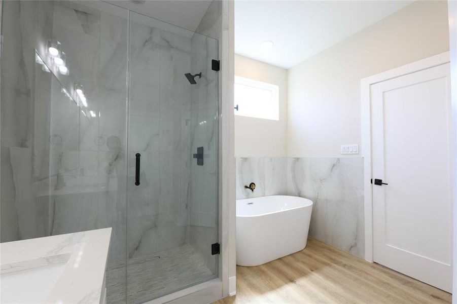 Walk-in shower & soaking tub for at-home spa days.