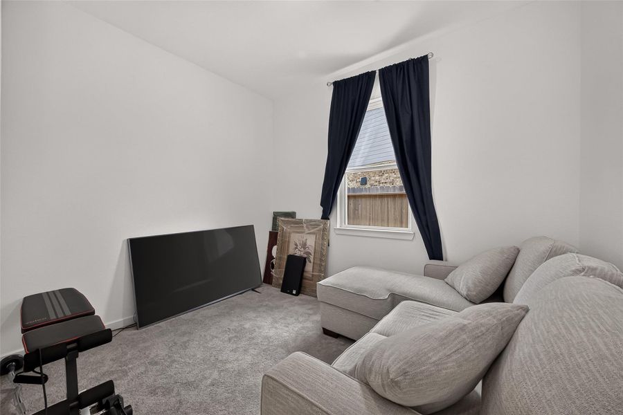 This flexible space is perfect for a home office or just kicking back and relaxing.