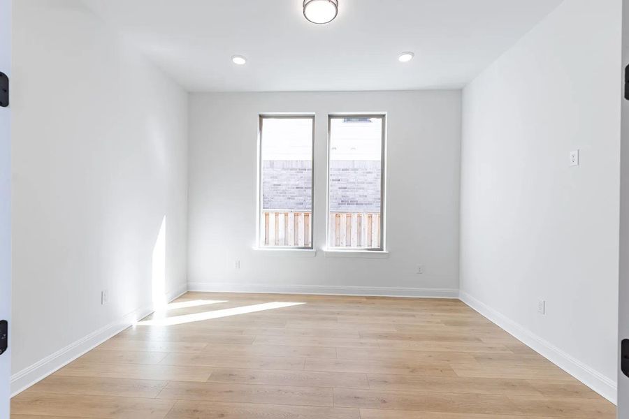 Spacious, unfurnished interior of a new home in Parmer Ranch 60, Georgetown (Image 21).