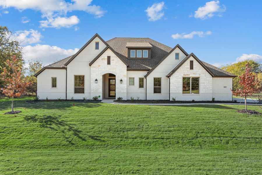 Front exterior of a new home in Rolling Creek Ranch, Aledo, TX, highlighting curb appeal (Image 31). Front exterior of a new home in Rolling Creek Ranch, Aledo, TX, highlighting curb appeal (Image 31).