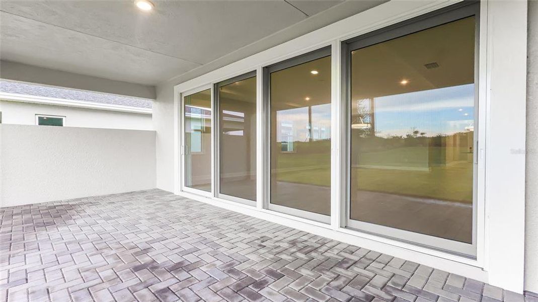 Exterior details and patio area of a home in Cresswind at Lake Harris, Tavares (Image 32). Exterior details and patio area of a home in Cresswind at Lake Harris, Tavares (Image 32).