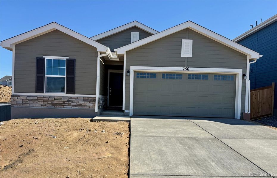 Front exterior of a new home in , Watkins, CO, highlighting curb appeal (Image 1). Front exterior of a new home in , Watkins, CO, highlighting curb appeal (Image 1).