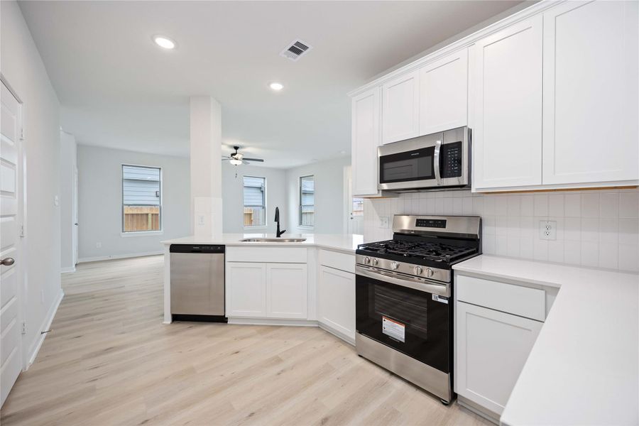 Furnished interior view inside a new home in Bluestem, Brookshire (Image 8). Furnished interior view inside a new home in Bluestem, Brookshire (Image 8).