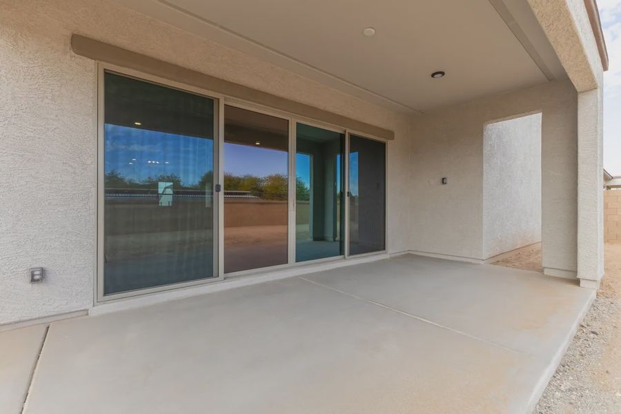Exterior details and patio area of a home in Valencia at Granite Vista, Waddell (Image 23).