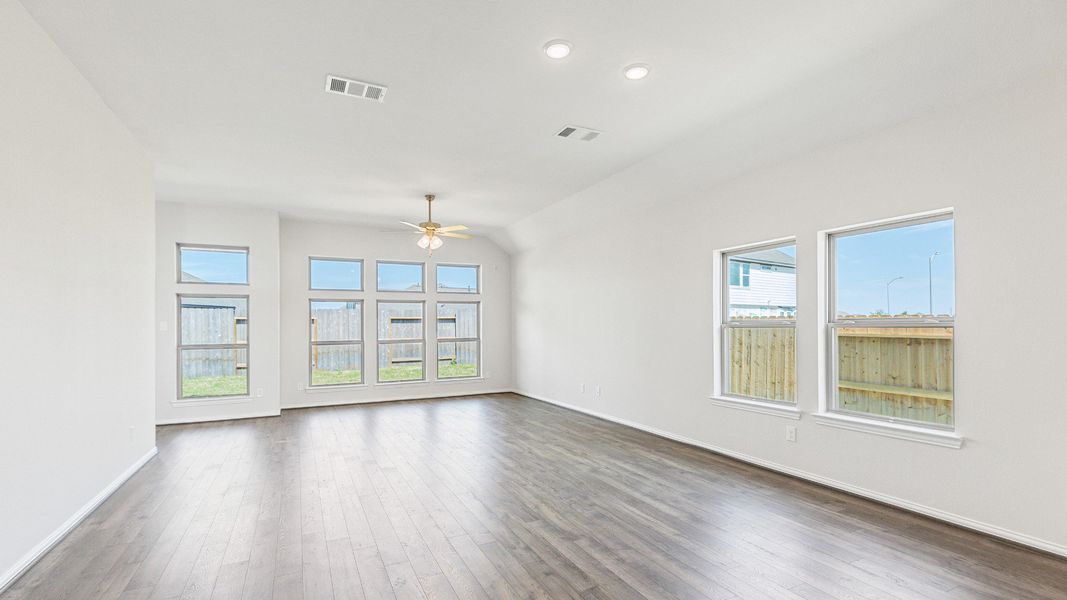 Furnished interior view inside a new home in Sunterra, Katy (Image 4).