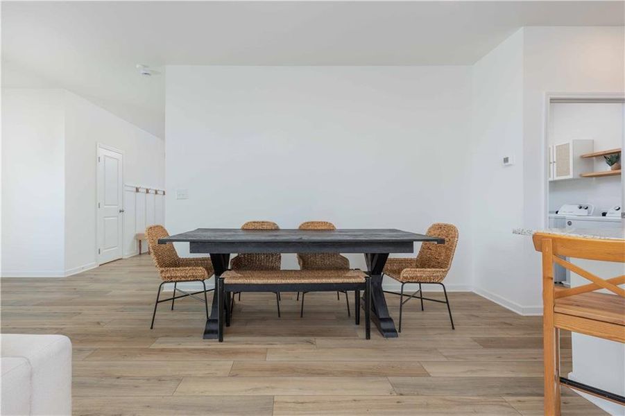 Furnished interior view inside a new home in Creekside at Farmers Crossing, Ball Ground (Image 9).