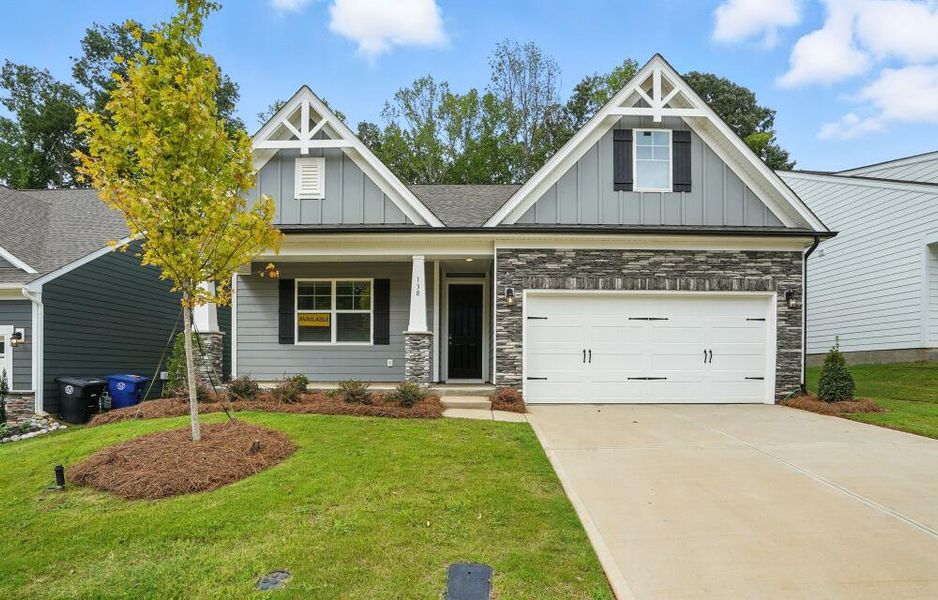 Front exterior of a new home in Villas at Prestwick, Mooresville, NC, highlighting curb appeal (Image 2). Front exterior of a new home in Villas at Prestwick, Mooresville, NC, highlighting curb appeal (Image 2).