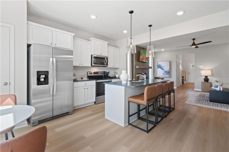 Furnished interior view inside a new home in Enclave at Evergreen, Fairburn (Image 30).