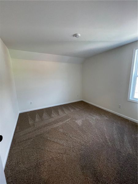 Spacious, unfurnished interior of a new home in Springwood Grove, Central (Image 18).