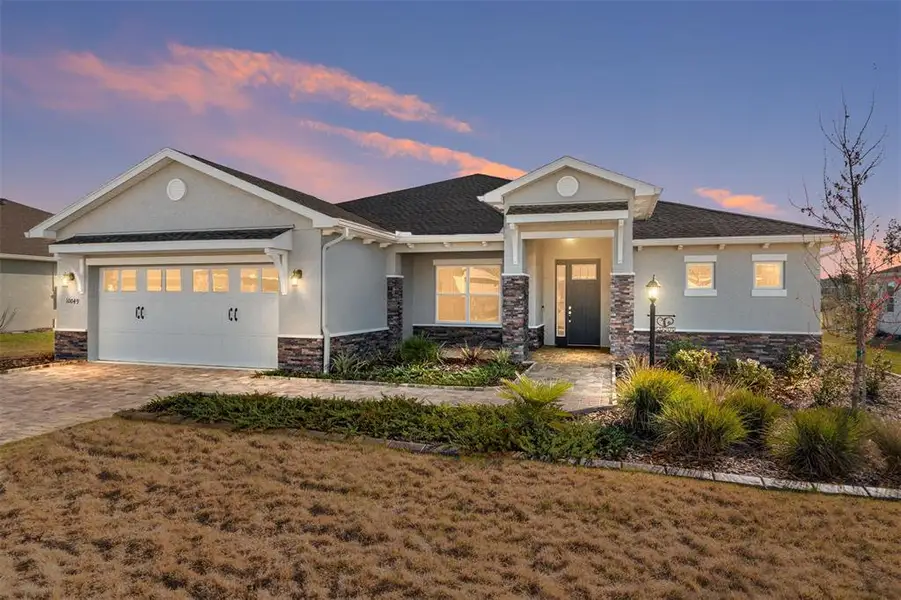 Front exterior of a new home in , Ocala, FL, highlighting curb appeal (Image 29).