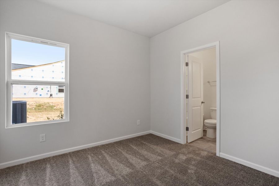 Spacious, unfurnished interior of a new home in Cambridge Reserve, Angier (Image 26).