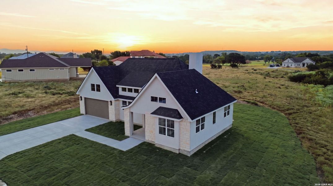 Front exterior of a new home in , Bandera, TX, highlighting curb appeal (Image 24). Front exterior of a new home in , Bandera, TX, highlighting curb appeal (Image 24).