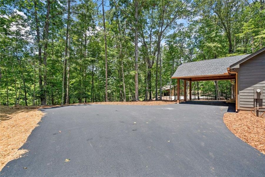 Exterior details and patio area of a home in , Ellijay (Image 31).
