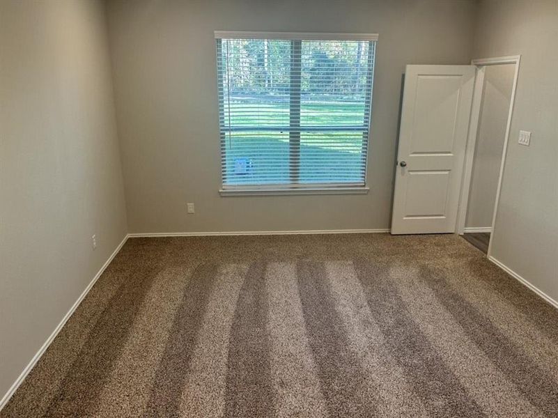 Master bedroom has a soaring vaulted ceiling!