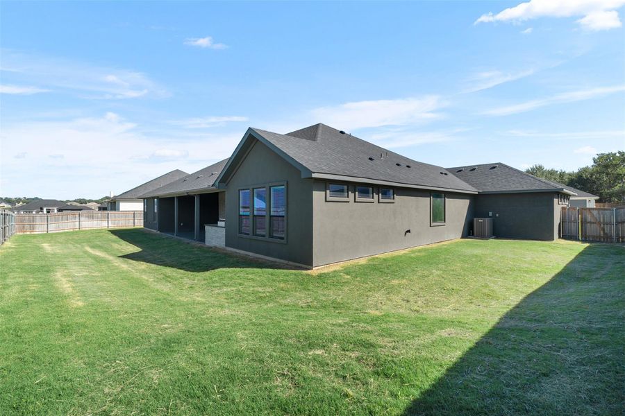 Front exterior of a new home in , Nolanville, TX, highlighting curb appeal (Image 25).