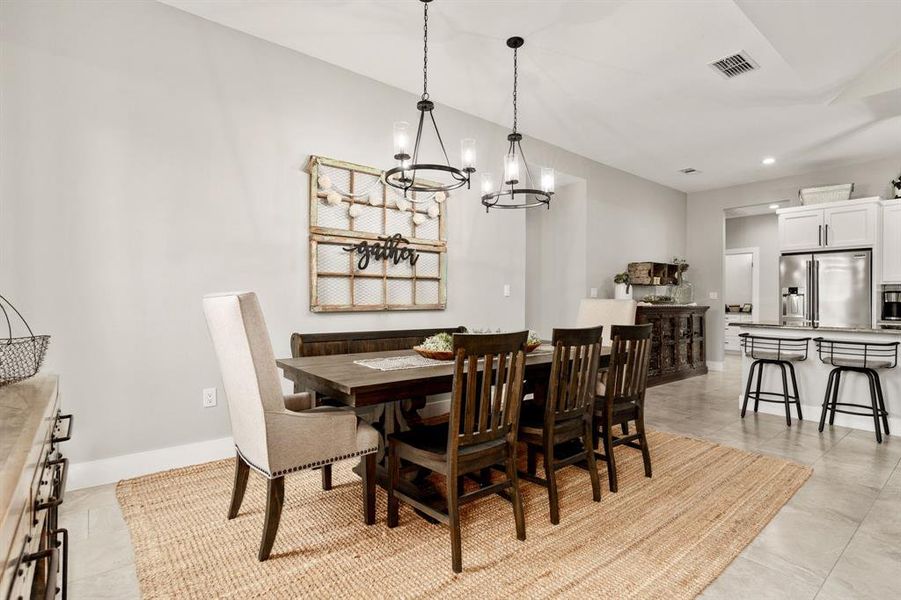 Two Large Decorative Lights define the dining space.