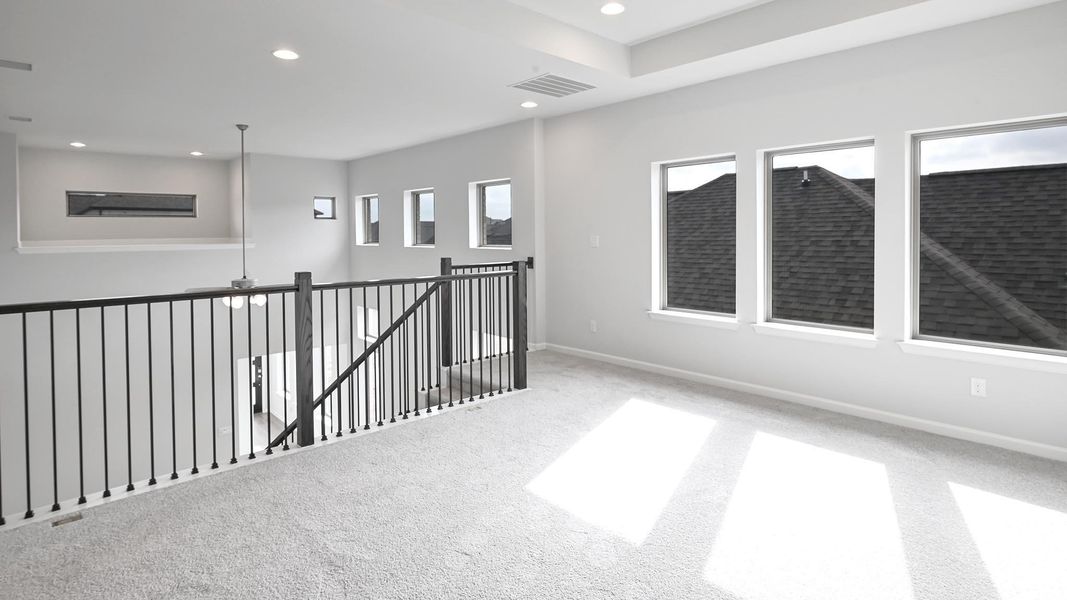 Carpeted empty room with recessed lighting and ceiling fan Carpeted empty room with recessed lighting and ceiling fan