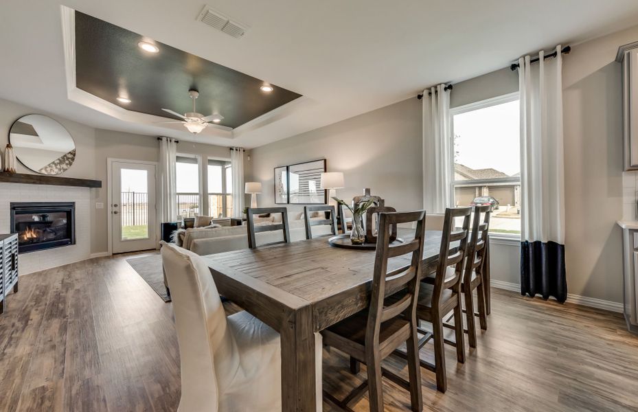 Dining area off kitchen with large window