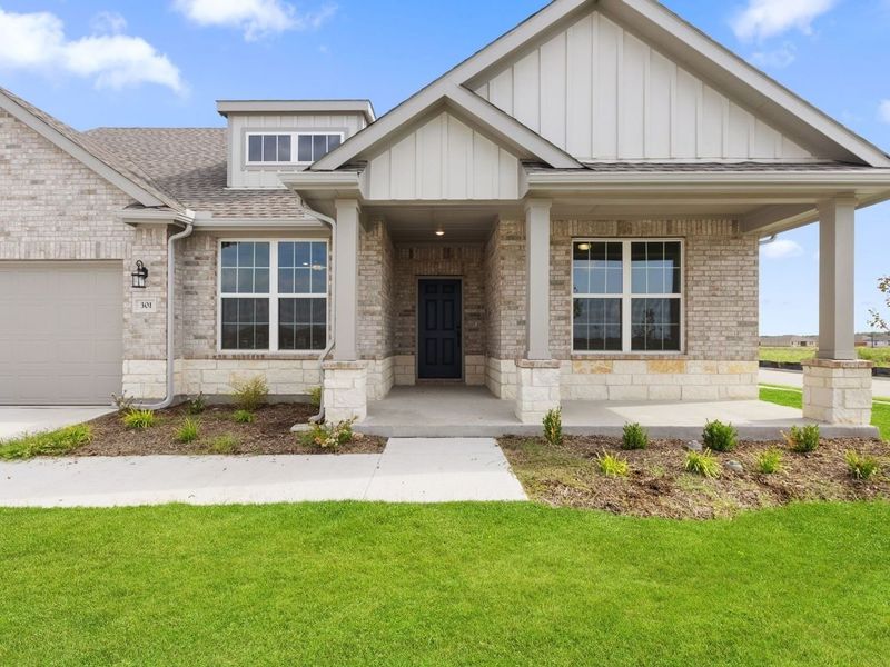 Front exterior of a new home in Waverly Estates, Nevada, TX, highlighting curb appeal (Image 17).