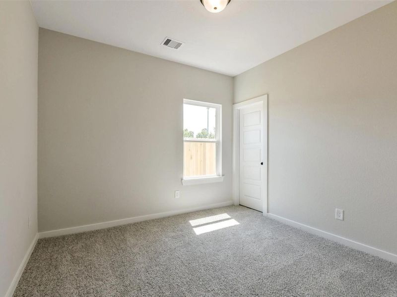 Spacious, unfurnished interior of a new home in Sundance Cove, Crosby (Image 30).