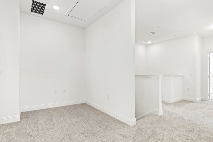Spacious, unfurnished interior of a new home in The Tribute, The Colony (Image 23).