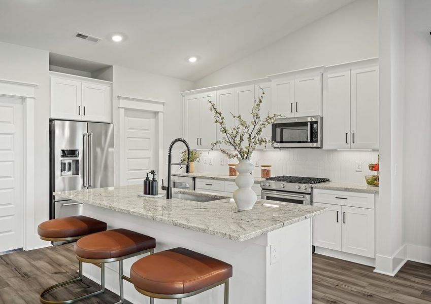 Stainless steel appliances are included.