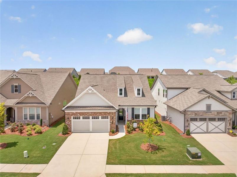 Front exterior of a new home in , Hoschton, GA, highlighting curb appeal (Image 1). Front exterior of a new home in , Hoschton, GA, highlighting curb appeal (Image 1).