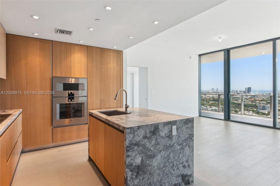 Furnished interior view inside a new home in Five Park, Miami Beach (Image 11).