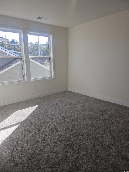 Spacious, unfurnished interior of a new home in Avery Woods, Longs (Image 22).