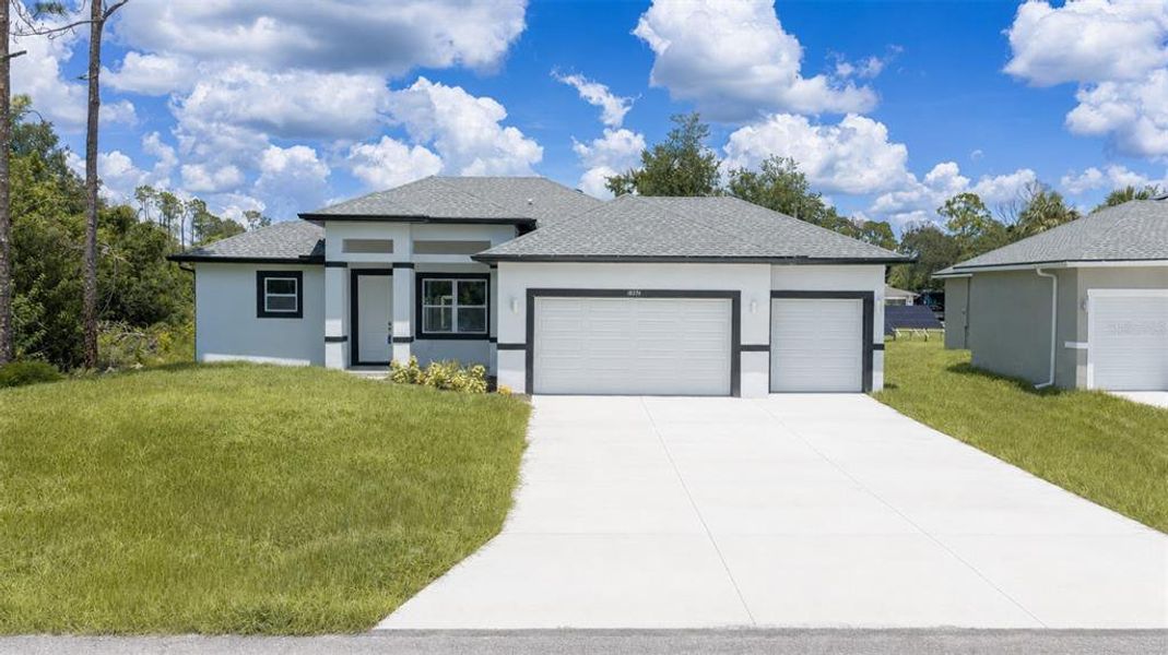Front exterior of a new home in , Port Charlotte, FL, highlighting curb appeal (Image 28).