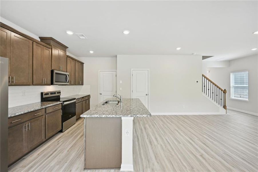 Furnished interior view inside a new home in Hawthorne Station, College Park (Image 10).