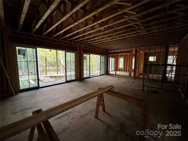 The lower level family room centers around a fireplace and features a full wet bar The lower level family room centers around a fireplace and features a full wet bar