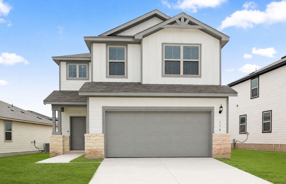 Front exterior of a new home in Sonterra, Jarrell, TX, highlighting curb appeal (Image 24). Front exterior of a new home in Sonterra, Jarrell, TX, highlighting curb appeal (Image 24).
