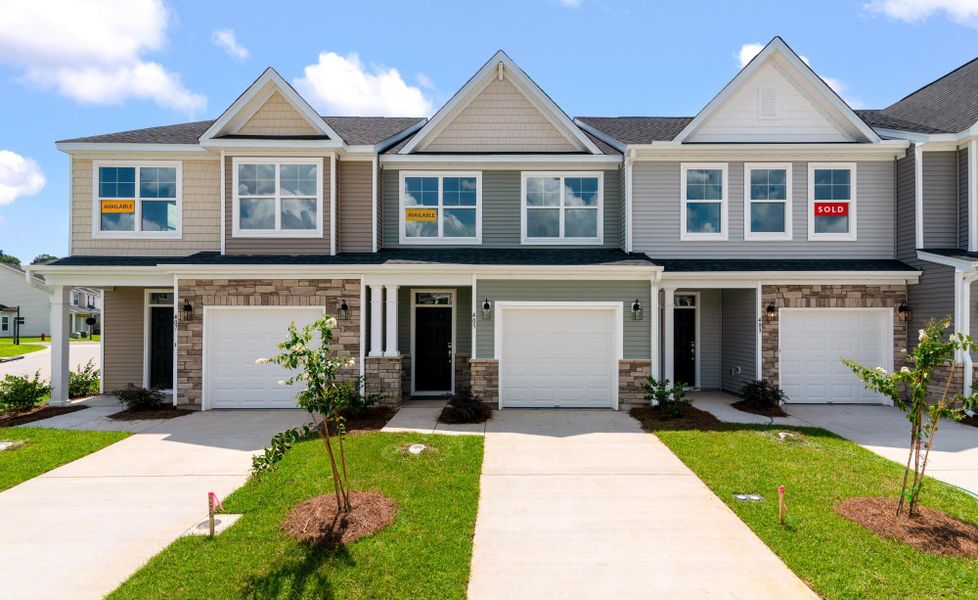 Front exterior of a new home in The Landings at Montague, Goose Creek, SC, highlighting curb appeal (Image 1). Front exterior of a new home in The Landings at Montague, Goose Creek, SC, highlighting curb appeal (Image 1).