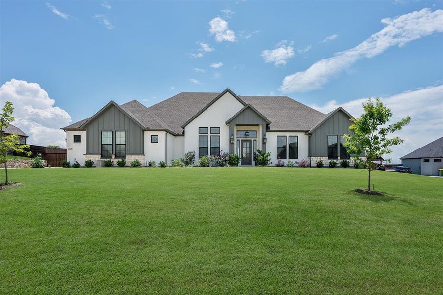 Front exterior of a new home in , Waxahachie, TX, highlighting curb appeal (Image 2). Front exterior of a new home in , Waxahachie, TX, highlighting curb appeal (Image 2).