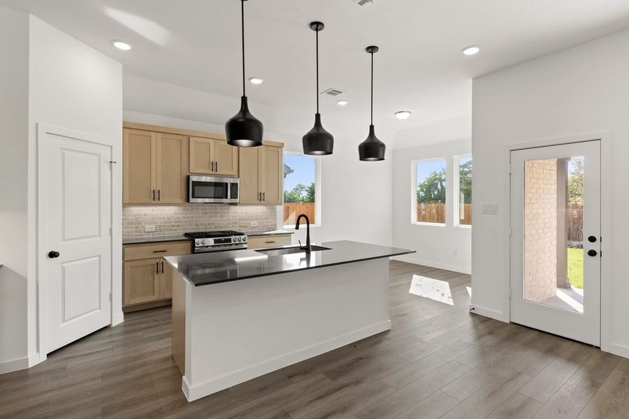 Open Kitchen-Dining Room featuring the Foundry Collection