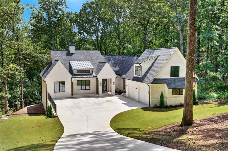 Front exterior of a new home in , Cumming, GA, highlighting curb appeal (Image 2).