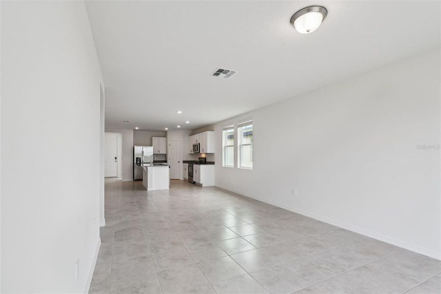 Spacious, unfurnished interior of a new home in Lake Deer Estates - Signature Series, Poinciana (Image 22).