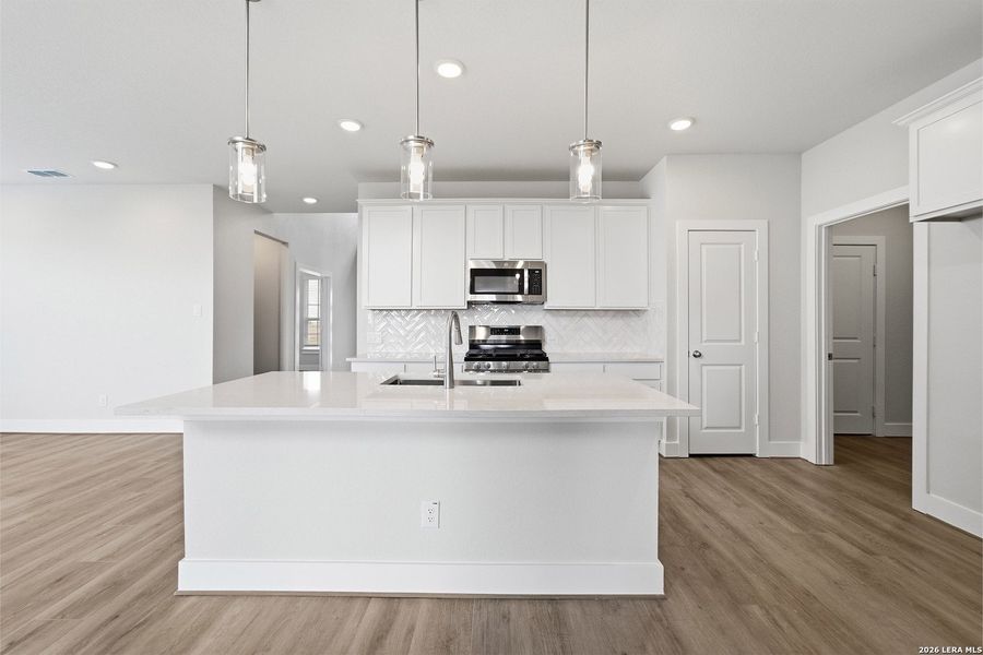 Furnished interior view inside a new home in Hickory Ridge, Elmendorf (Image 11).