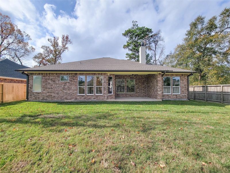 Exterior details and patio area of a home in , Conroe (Image 4).