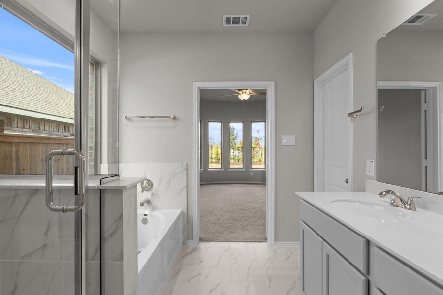 Furnished interior view inside a new home in Bridgeland, Cypress (Image 11).