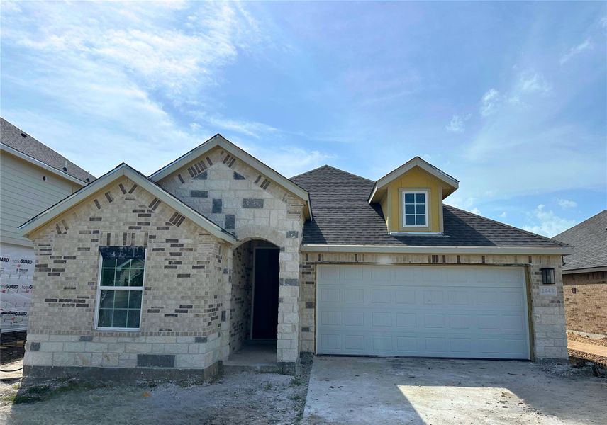 Front exterior of a new home in Ellis Cove, Seabrook, TX, highlighting curb appeal (Image 2). Front exterior of a new home in Ellis Cove, Seabrook, TX, highlighting curb appeal (Image 2).