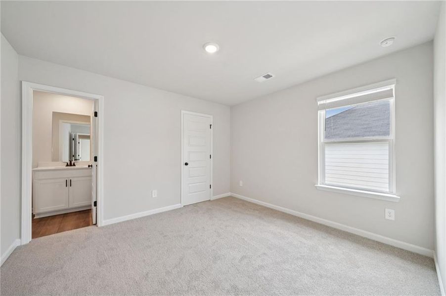 Spacious, unfurnished interior of a new home in Vines at Mill Creek - Estate Series, Braselton (Image 39).